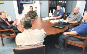  ?? Contribute­d photo ?? U.S. Sen. Richard Blumenthal, left, D-Conn., meets with officials in New Milford on Wednesday to discuss FEMA relief for victims of May’s macroburst storm.