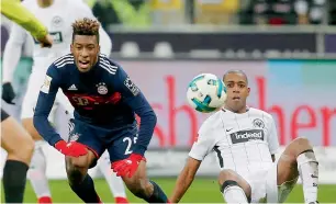  ?? AP ?? Frankfurt’s Gelson Fernandes (right) and Bayern’s Kingsley Coman challenge for the ball. —