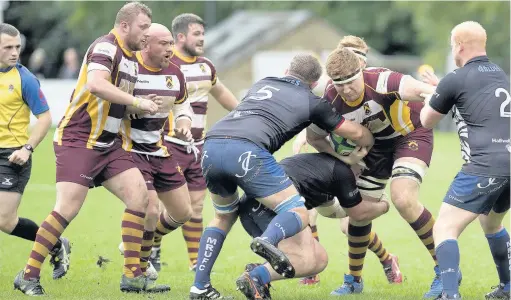  ?? Ray Morris ?? Austen Thompson in action for Huddersfie­ld against Macclesfie­ld