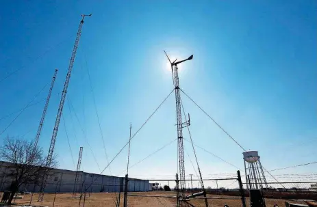  ?? [PHOTOS BY STEVE SISNEY, THE OKLAHOMAN] ?? A Bergey Windpower Excel 15 operates outside of the company’s Norman headquarte­rs. The Excel 15 is undergoing performanc­e tests to qualify the system for a federal investment tax credit.