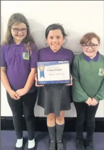  ??  ?? Proudly accepting the award were, left to right: Ashleigh Beasley, Heidi Hibberd and Holly Clarke.