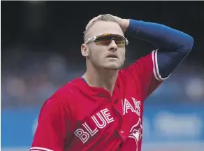  ?? CHRIS YOUNG/THE CANADIAN PRESS ?? It was a frustratin­g Sunday for Josh Donaldson and the Blue Jays, who were crushed 19-1 by Houston.