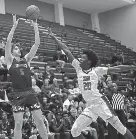  ?? STU BOYD II/THE COMMERCIAL APPEAL ?? Colliervil­le’s Cooper Mcrae shoots a 3-pointer against Bartlett’s Rashad Williams in the District 15-4A tournament on Saturday.