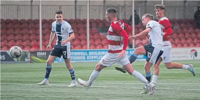  ?? ?? Aidan Nesbitt fires home Falkirk’s second goal against Hamilton.