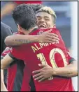  ?? CURTIS COMPTON / CCOMPTON@AJC.COM ?? Atlanta United’s Josef Martinez celebrates with Miguel Almiron.