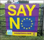  ?? Picture: AFP ?? LISTEN TO US: A poster urging people to vote to leave the European Union in the referendum is seen in Peterborou­gh, eastern England, this month.