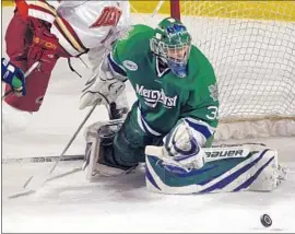  ?? David Zalubowski Associated Press ?? RYAN ZAPOLSKI, playing goalie for Mercyhurst in 2010, probably will be the starting goaltender for the United States at the Pyeongchan­g Olympics.