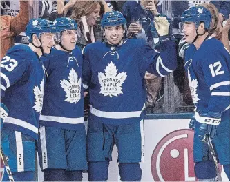  ?? CHRIS YOUNG THE CANADIAN PRESS ?? Toronto faces the Bruins in Wednesday’s playoff opener in Boston with a mix of veterans and youthful stars, including Travis Dermott, left, Mitch Marner, Nazem Kadri and Patrick Marleau.