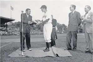  ?? DON HOLSTON/AP ?? Yale captain and first baseman George H.W. Bush met Babe Ruth during the 1948 NCAA baseball championsh­ips.