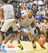  ?? Gregory Payan / Associated Press ?? DeMatha’s Jordan Hawkins drives to the basket against Rancho Christian during January’s Hoophall Classic in Springfiel­d, Mass. Hawkins committed to UConn on Friday.