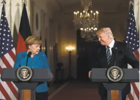  ?? Saul Loeb / AFP / Getty Images ?? German Chancellor Angela Merkel and President Trump sidestep disagreeme­nts during a news conference in the East Room of the White House.