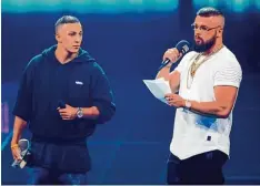  ?? Foto: Axel Schmidt, afp ?? Sie haben es „geschafft“: Nach der skandalöse­n Verleihung des Echos an die Rapper Kollegah & Farid Bang ist der Musikpreis Geschichte.