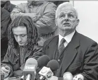  ?? AP PHOTO ?? In this 1999 file photo, Adem Demaci, right, the political representa­tive of the Kosovo Liberation Army, talks to the media during a press conference in Pristina. Adem Demaci, a human rights defender who embodied Kosovo’s national resistance and was...