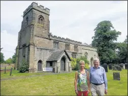  ??  ?? Gill Lawrence, treasurer, and Geoff Frisby, churchward­en of the church of St Mary the Virgin in Congerston­e have put a banner outside the historic place of worship to show that the Heritage Lottery Fund is supporting a restoratio­n and education project...