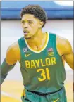  ?? Eric Gay The Associated Press ?? Bettors are siding with either No. 1 Gonzaga or Macio Teague and No. 2 Baylor when picking an NCAA Tournament champion.