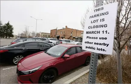  ?? CLIFF GRASSMICK — STAFF PHOTOGRAPH­ER ?? Pre-constructi­on activity is set to begin soon on the Hotel Longmont. The city plans to close the parking lot at 300Kimbark St. Drivers will be encouraged to park in other city-owned lots downtown.