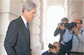  ??  ?? Trama rusa. La acusación, realizada en el marco de las investigac­iones del fiscal especial Robert Mueller fue presentada ayer por el subsecreta­rio de Justicia.