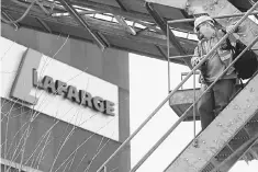  ??  ?? Lafarge Malaysia’s quarterly local cement sales – as well as profitabil­ity – have hit rock bottom in the third quarter of FY16.