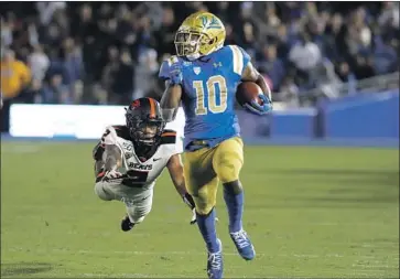  ?? LUIS SINCO Los Angeles Times ?? DEMETRIC FELTON JR. ran for 331 yards and a touchdown, and caught 55 passes, last season for UCLA.