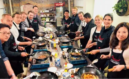  ??  ?? Visitors from all over the world come to Chili Cool Chengdu’s shared kitchen in Sichuan to explore its culinary culture.