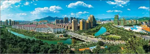  ?? XIN RUOKE / FOR CHINA DAILY ?? The Licun River is the longest river in downtown Qingdao. It has become a scenic watercours­e featuring leisure facilities on both banks.