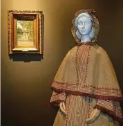  ??  ?? An Italian- made linen garden dress with hooded cape, made in 1865, alongside a 19th century painting from the uffizi Gallery’s Galleria di Arte Moderna collection.