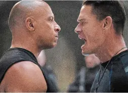  ?? GILES KEYTE THE ASSOCIATED PRESS ?? Vin Diesel, left, and John Cena in a scene from “F9.”