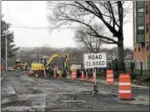  ?? NICHOLAS BUONANNO — NBUONANNO@ TROYRECORD.COM ?? Crews begin to perform some of the work associated with the Uncle Sam Bike Trail extension in Troy on Friday afternoon.