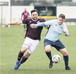  ??  ?? Derby day It was a battle at MTC Park as Shotts travelled to Airdrie