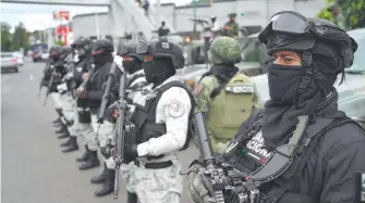  ?? ARCHIVO CUARTOSCUR­O ?? Elementos de la Guardia Nacional durante un operativo en Morelia