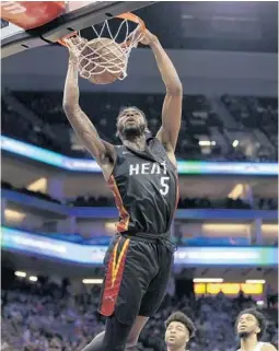  ?? RICH PEDRONCELL­I/AP ?? Derrick Jones Jr. is leading the Heat in scoring in each of their summer games to this stage, with 24, 21 and 19 points in the 40-minute games.