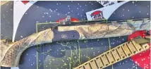  ?? PHOTO CONTRIBUTE­D BY LARRY CASE ?? CZ-USA’s Magnum Reaper, an over-and-under 12-gauge shotgun, gives turkey hunters the chance to set chokes differentl­y for close range and long range.