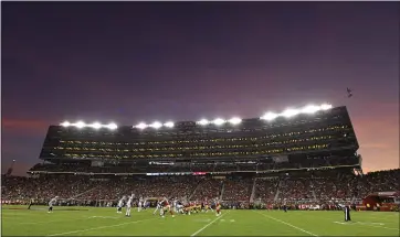  ?? STAFF FILE PHOTO ?? The San Francisco 49ers play the Oakland Raiders at Levi’s Stadium in Santa Clara on Nov. 1. If the Raiders decide to leave Oakland a year before their new Las Vegas stadium is ready, experts say the team may want to share Levi’s with the 49ers.