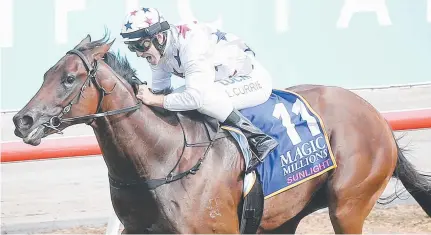  ??  ?? DOMINANCE: Jockey Luke Currie rides Sunlight to victory in the Magic Millions Two- Years- Old Classic on the Gold Coast.