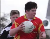  ??  ?? Stephen Hickey of Davidstown-Courtnacud­dy on the ball as Jason Brennan (St. Joseph’s) looks on during their Under-20 football clash on Friday.