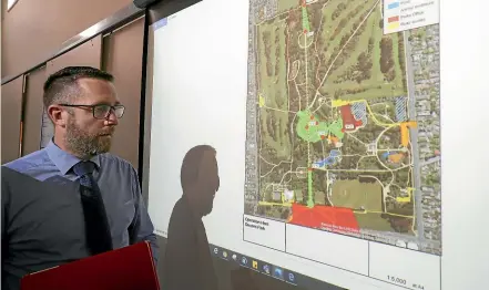  ?? ROBYN EDIE/STUFF ?? Detective Alun Griffiths with a map of Queens Park, showing the probable movements of missing Invercargi­ll man Raymond Horn, who was last seen on February 15.