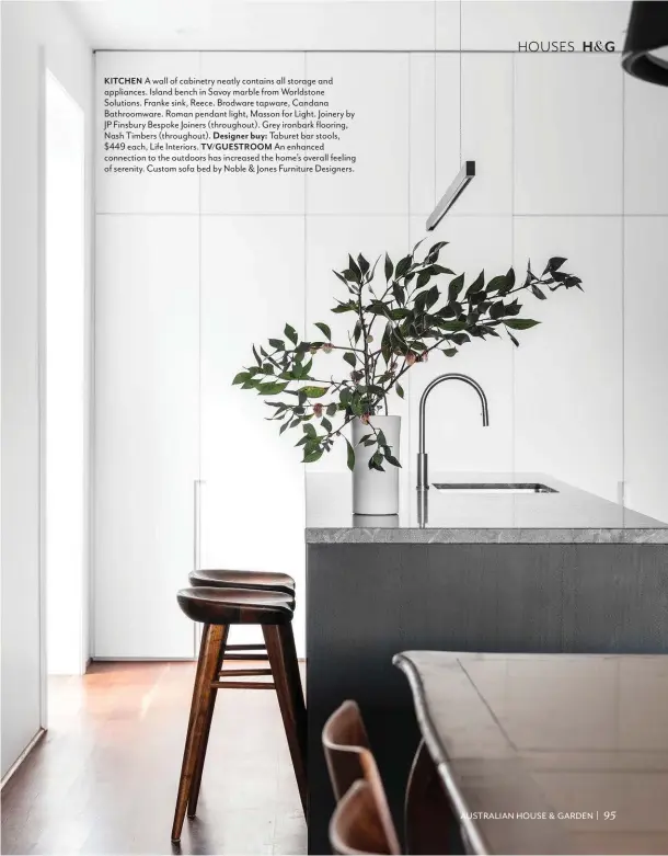  ??  ?? KITCHEN A wall of cabinetry neatly contains all storage and appliances. Island bench in Savoy marble from Worldstone Solutions. Franke sink, Reece. Brodware tapware, Candana Bathroomwa­re. Roman pendant light, Masson for Light. Joinery by JP Finsbury Bespoke Joiners (throughout). Grey ironbark flooring, Nash Timbers (throughout). Designer buy: Taburet bar stools, $449 each, Life Interiors. TV/GUESTROOM An enhanced connection to the outdoors has increased the home’s overall feeling of serenity. Custom sofa bed by Noble & Jones Furniture Designers.