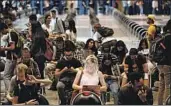  ?? AL SEIB Los Angeles Times ?? VOTERS at a UCLA voting center had to wait about two hours to cast a ballot on Tuesday.