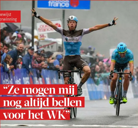  ?? FOTO PHOTO NEWS ?? Oliver Naesen juicht in een hondenweer. De Oost-Vlaming is pas de derde Belg die dit seizoen een eendagswed­strijd in de WorldTour wint.