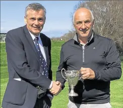  ?? ?? Ray Holmes, right, receives his trophy from Canterbury captain Scott Lindsay