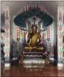  ?? COURTNEY BONNELL — THE ASSOCIATED PRESS ?? A colorful temple marks the entrance to Wat Pha Lat temple outside Chiang Mai, Thailand.