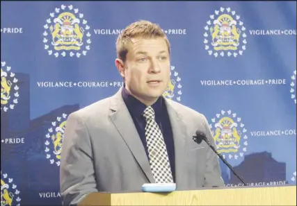  ?? CP photo ?? Calgary Police Staff Sgt. Martin Schiavetta speaks to reporters. Police updated members of the media about an investigat­ion after the body of an infant was found near a recycling depot on Christmas Eve.