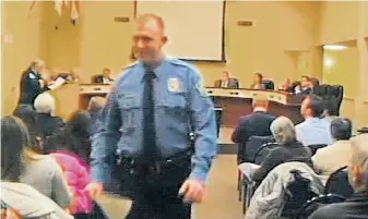  ?? Associated Press ?? In a photo made from a video, police Officer Darren Wilson attends a City Council meeting in Ferguson, Mo., in February, months before he fatally shot 18-year-old Michael Brown.