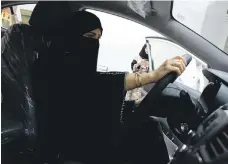  ?? Reuters ?? A Saudi woman tries out a car at the first car showroom solely for women in Jeddah in January this year