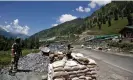  ?? Photograph: Danish Ismail/Reuters ?? India’s border security force soldiers stand guard at a checkpoint along a highway leading to Ladakh, at Gagangeer in Kashmir’s Ganderbal district.