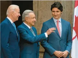  ?? ANDREW HARNIK/AP ?? President Joe Biden, left, Mexican President Andres Manuel Lopez Obrador and Canadian Prime Minister Justin Trudeau meet Tuesday at a summit in Mexico City.