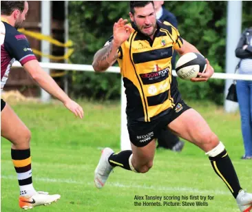  ??  ?? Alex Tansley scoring his first try for the Hornets. Picture: Steve Wells