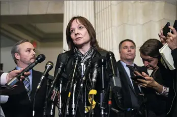  ?? DREW ANGERER/GETTY IMAGES ?? Mary Barra, chief executive officer of General Motors, speaks to reporters after a Wednesday meeting with Sen. Rob Portman (R-Ohio) and Sen. Sherrod Brown (D-Ohio) on Capitol Hill in Washington, D.C.