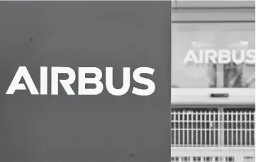  ??  ?? In this file photo the logo of European aircraft manufactur­er Airbus is pictured outside the entrance of the site of Airbus’ Wings Campus in Blagnac following a European company council. — AFP photo