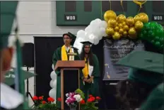  ?? PETER CURRIER — LOWELL SUN ?? Valedictor­ian Shiv Patel, left, and Salutatori­an Kristine Patel gave a joint speech to their classmates as they received their high school diplomas during the June 1, 2023commen­cement ceremony for the Collegiate Charter School of Lowell.